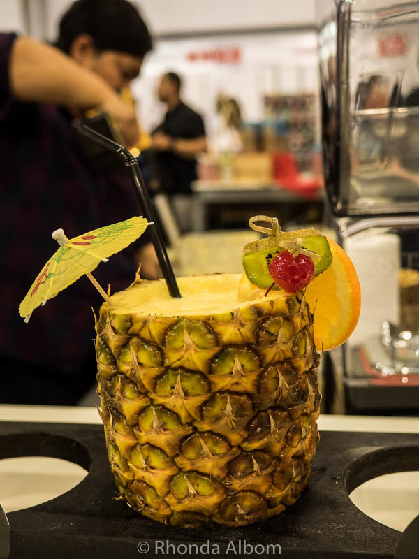A fresh fruit smoothy in a pineapple cup at the Auckland Food Show 2016