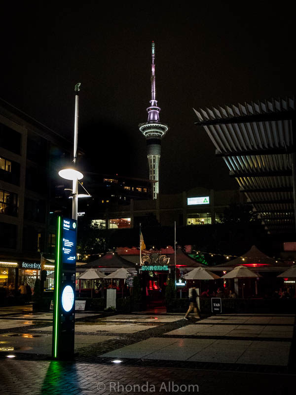 Sky Tower at night seen from Viaduct Harbour, Auckland, New Zealand