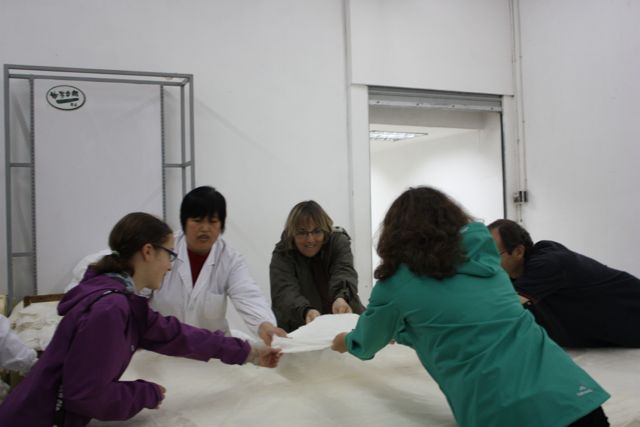Silk factory in China making a silk blanket - world schooling in China