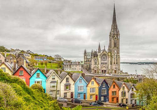 Aerial view of the Cathedral and colored houses in Cobh, Ireland