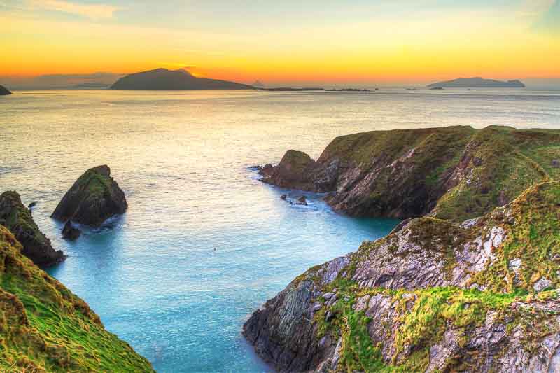 Sunset over Dunquin Bay on Dingle Peninsula on an Irish road trip