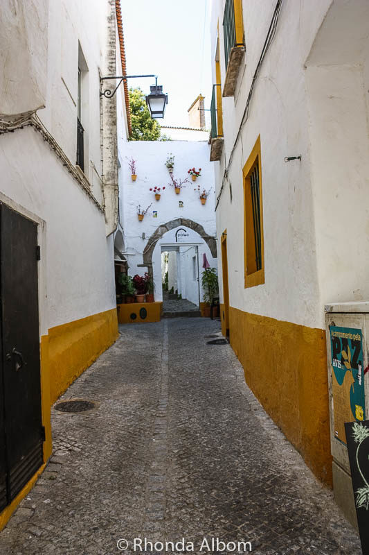 One of many alleyways leading from Giraldo Square in Evora Portugal