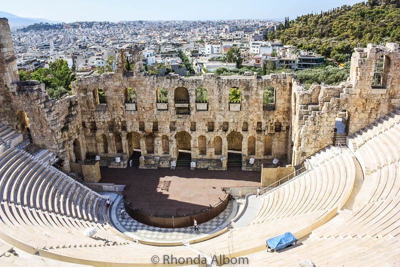 The Odeon of Herodes Atticus is a stone theatre on the Acropolis in Athens Greece 