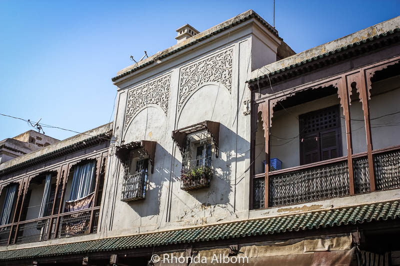 Houses in the old Jewish quarter in Fes, Morocco have balconies and large windows