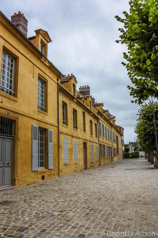 Off the beaten path in Paris France. A side street with residential row houses.
