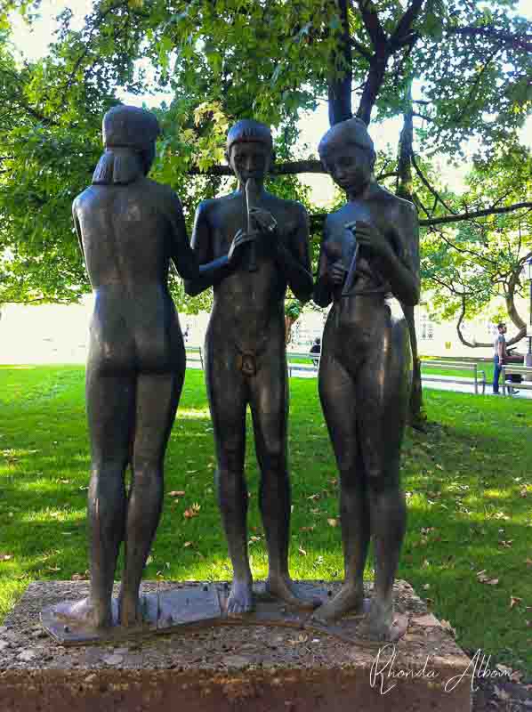 One Day in Salzburg, Austria's Home to Mozart, Castle, and More 17 Trio Making Musib by Max Rieder, a sculpture in Salzburg