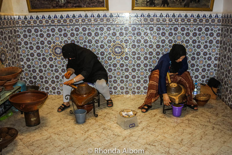 Is Moroccan Argan Oil from Goat Poop? Our Unusual Adventure 10 Berber women hand grinding the seeds to make Moroccan argon oil