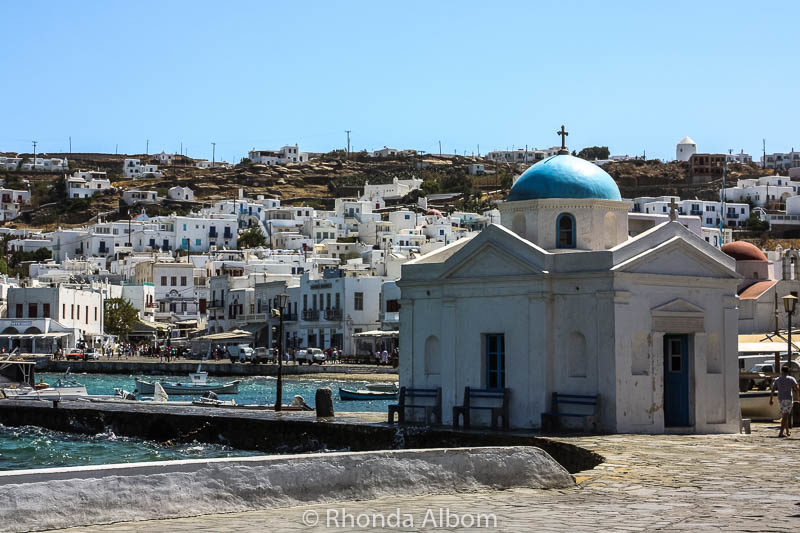 A blue roofed chapel with Little Venice in the background
