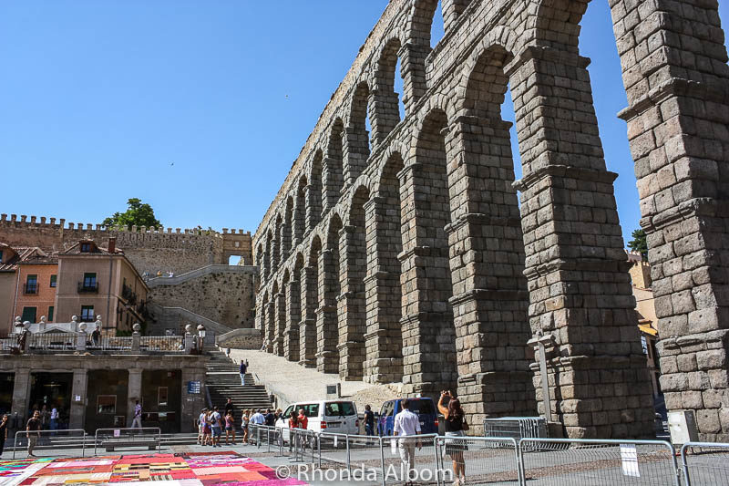 Things to Do in Segovia Spain: Ancient Aqueduct to Fairytale Castle 5 Aqueduct of Segovia Spain surrounding a main courtyard
