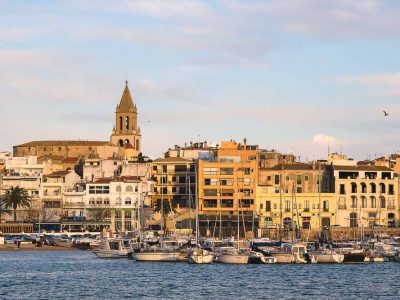 View of Palamos from the sea, the town of our long term home exchange that gave us a window into daily life in Spain