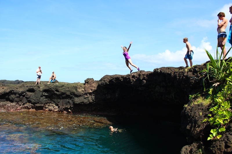 Jumping into the Lava Caves at To Sua Ocean Trench, Samoa