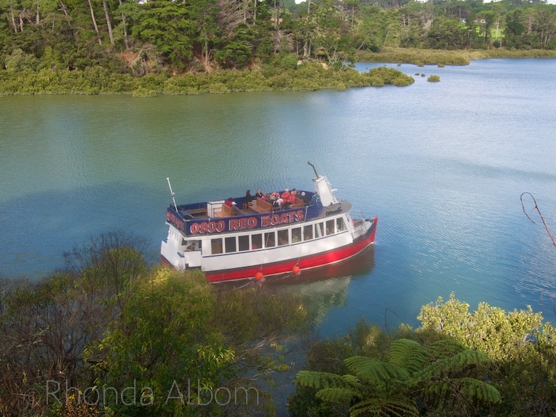 The Red Boat leaving Riverhead Tavern, Auckland, New Zealand