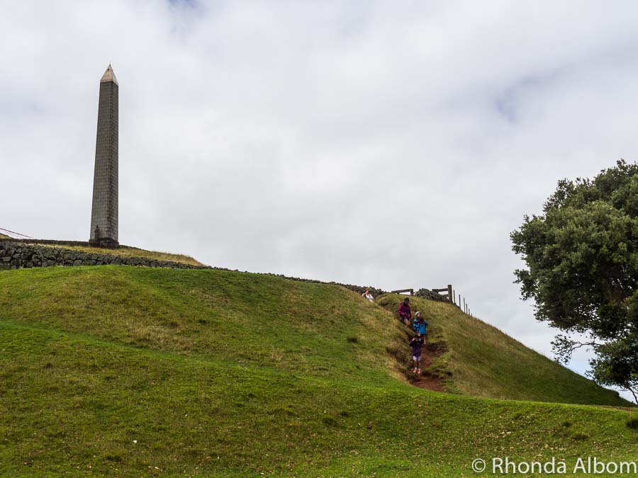 Locals hike to the monument on One Tree Hill in Cornwall Park in Auckland New Zealand