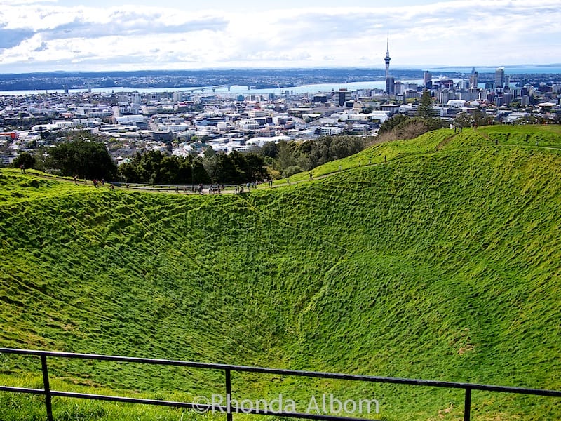 15 Beautiful Places in Auckland New Zealand - We Love Our City! 4 The Auckland city skyline seen while looking over the 50 metre crater of the extinct Mount Eden Volcano, Auckland New Zealand.