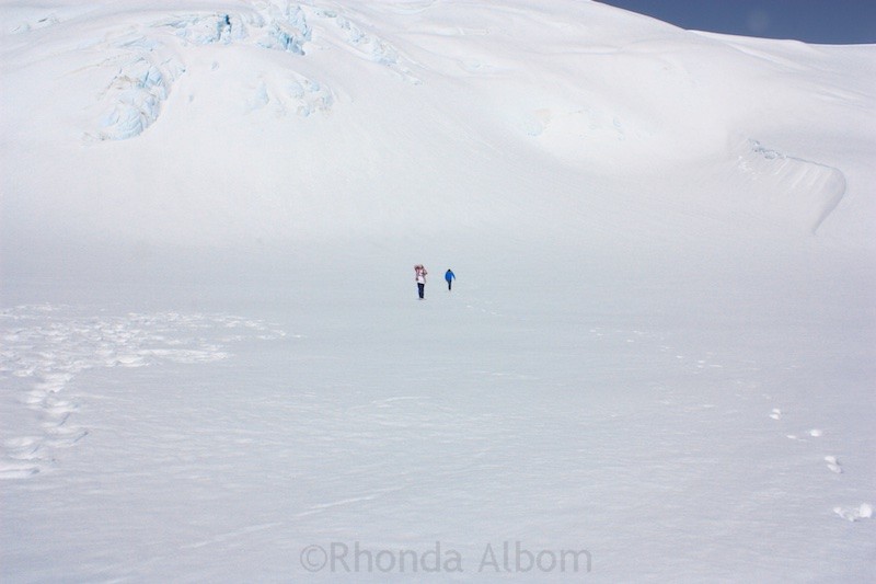 Two girls walking on Fox Glacier on the South Island of New Zealand