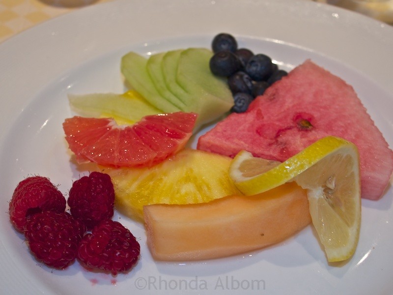 Avoid Cruise Weight Gain: Indulging Onboard without Worry! 13 A plate of fruit with breakfast to help avoid cruise weight gain