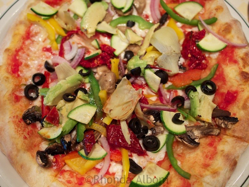 Avoid Cruise Weight Gain: Indulging Onboard without Worry! 10 Handmade pizza served at lunch time at a specialty restaurant on the Island Princess