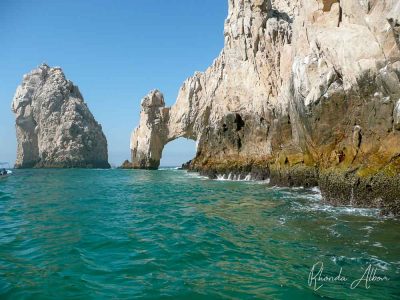 El Arco - The Arch seen from the water with other boats between us, one of the unique things to do in Cabo San Lucas Mexico
