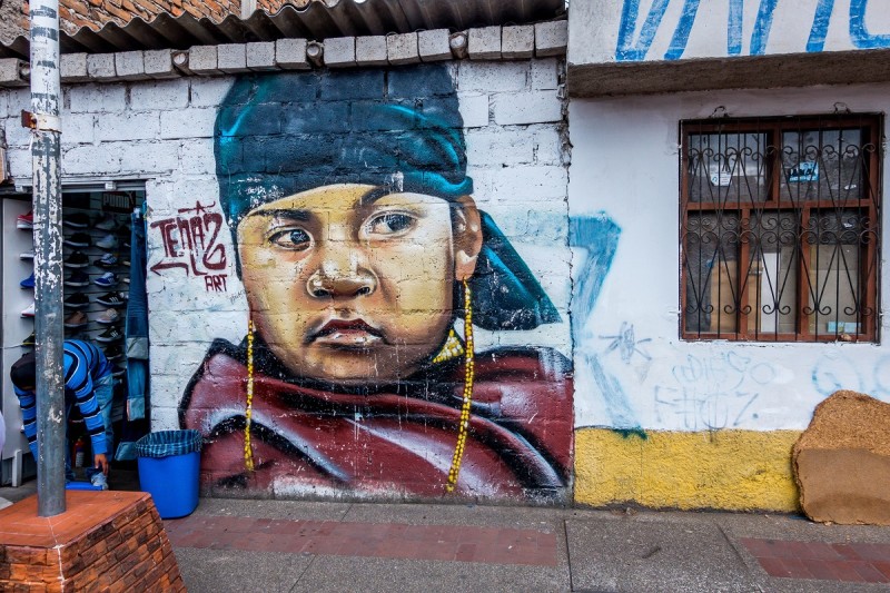 South American Street Art: Bold, Colourful, Powerful and Eclectic 4 Street art in Otavalo Ecuador of a boy by Tenaz