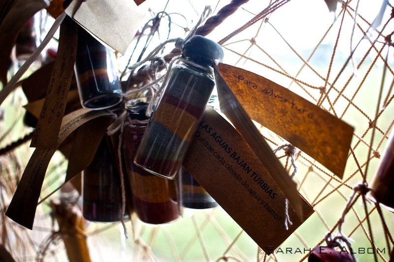 Hanging bottles of sand, La Redonda, Santa Fe, Argentina. Photo copyright ©Sarah Albom 2016