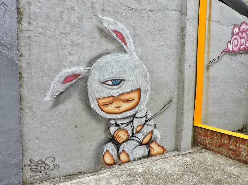Intriguing Street Art of Asia by Top Travel Bloggers 11 Alex Face Street Art in Taipei Taiwan