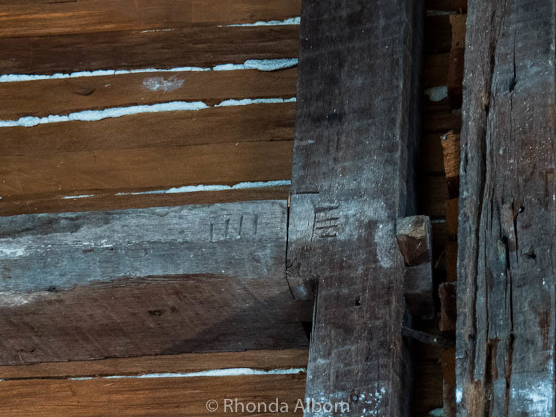 Close up of the hash markings used to put an 1800s house back together after it was moved from England to New Zealand.