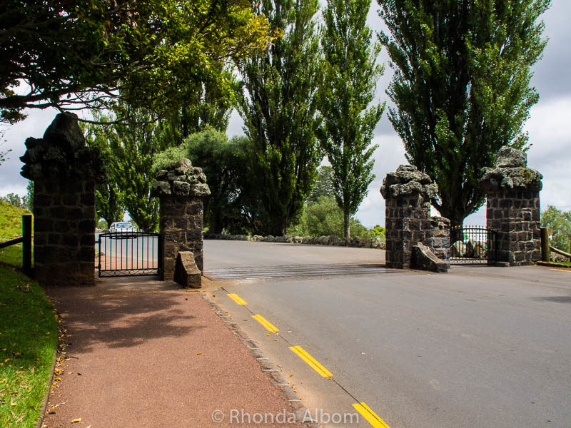 Exploring Cornwall Park, Auckland New Zealand 7 These gates are behind Huia Lodge and separate "Cornwall Park" from "One Tree Hill." The road leads to the summit. Or, if you cross the gate on foot, there is a walking path just on the other side.