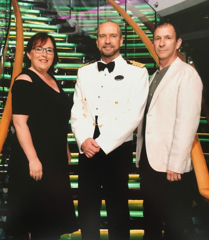 Standing with the captain of the Radiance of the Seas