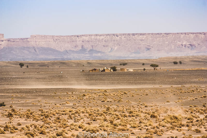 Our first view of the Bedouin camp in the distance in the Moroccan Sahara. 