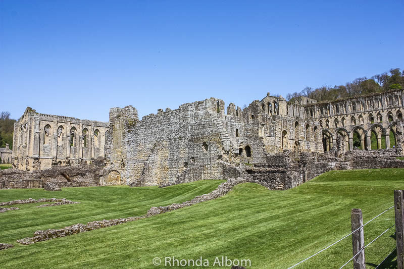 The Picturesque Ruins of Rievaulx Abbey in England's Countryside 2 Ruins in the distance in the British Countryside