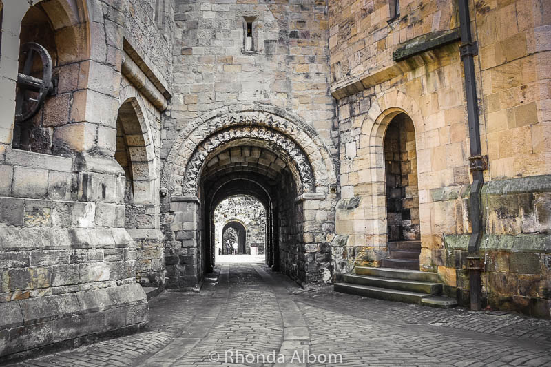 Alnwick Castle in England. It was used as Hogwarts in Harry Potter and used in Downton Abbey amongst others.