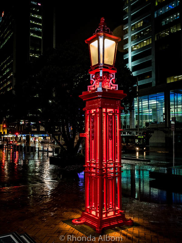 Lamps on Quay Street on a rainy night in Auckland New Zealand