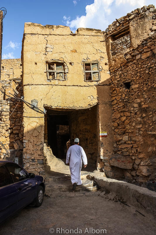 Our guide entering an alleyway in Misfat Oman