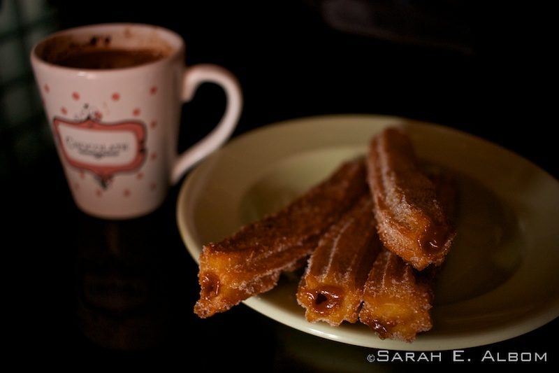 Argentinian Sweets: Our 10 Favourite Desserts in Argentina 9 Dulce de leche-filled churros and hot chocolate, two desserts in Argentina. Photo copyright ©Sarah Albom 2016