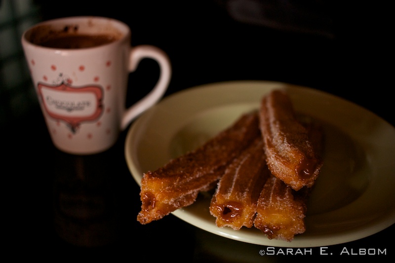 Dulce de leche-filled churros and hot chocolate, two desserts in Argentina. Photo copyright ©Sarah Albom 2016