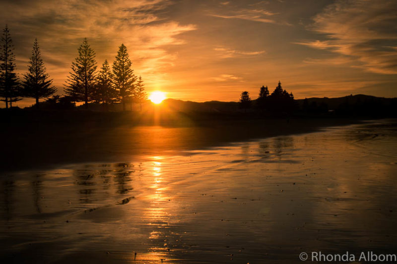 Sunrise on the beach in Gisborne New Zealand, the first place in the world to see each new day