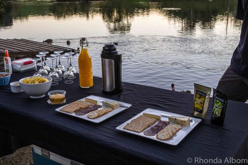 We were offered mulled wine, juice, cheese, and/or venison sausage as we watched sunset over Lake McLaren just before we set out on kayaks for a Waimarino glow worm tour