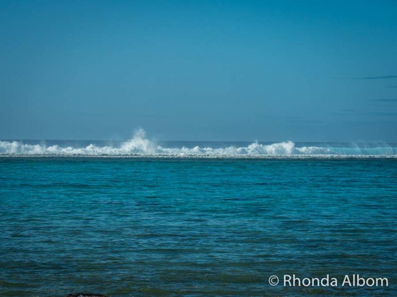 Rarotonga Travel Guide: What You Need to Know Before You Visit 8 Waves breaking on reef seen from Moana Sands Lagoon Resort on Rarotonga, Cook Islands