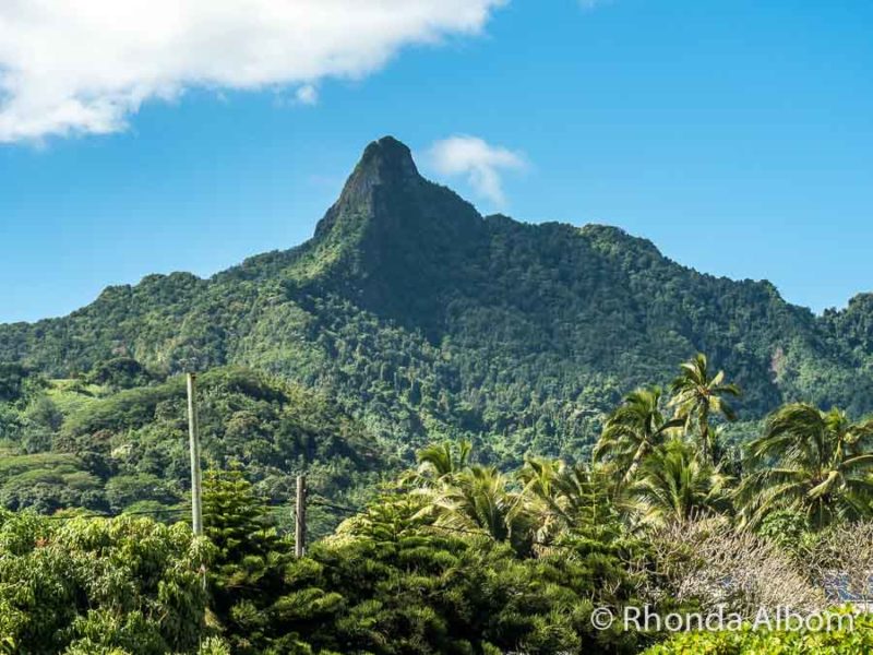 View of the The Needle a natural structure whose challenging day hike is one of many energetic things to do in Rarotonga on the Cook Islands