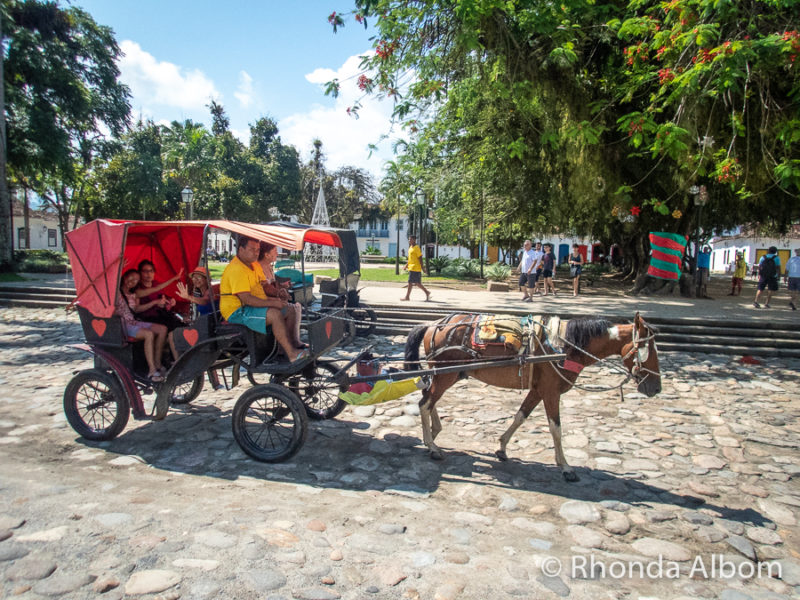 Horse drawn carriage in Matriz Square in Paraty Brazil