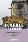 A crown and cross outside the Basilica in Lourdes France