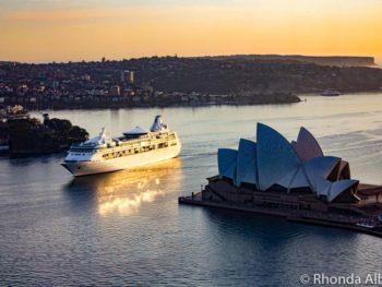 Repositioning Cruises move from one home city to another like this ship sailing into Sydney Harbour