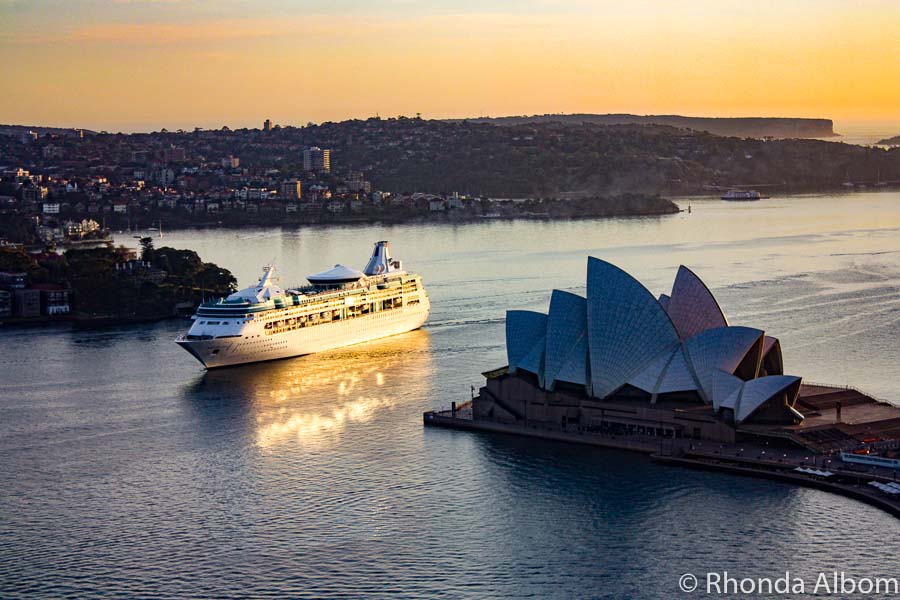 Repositioning Cruises move from one home city to another like this ship sailing into Sydney Harbour