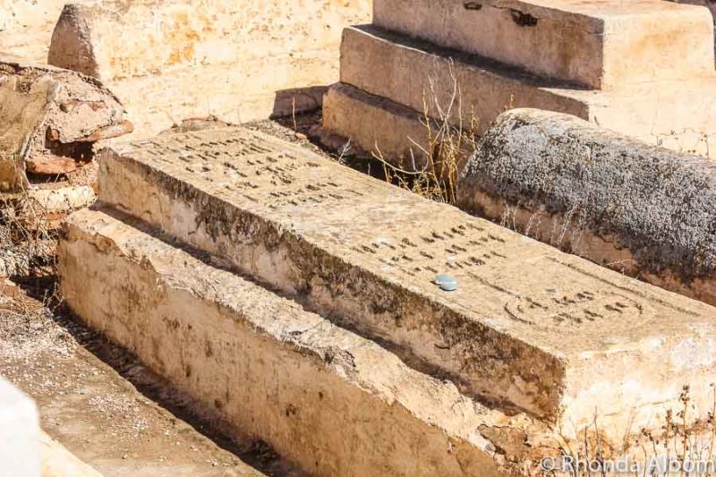 Stones placed upon a grave at the Jewish cemetery Marrakech Morocco