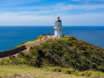 Cape Reinga lighthouse is used here to represent the best of New Zealand travel tips for first time visitors