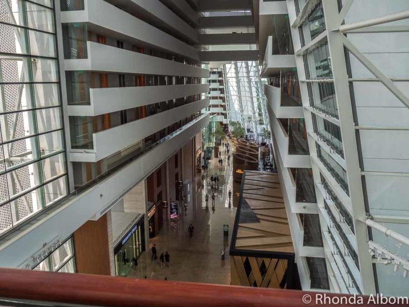 Marina Bay Sands Review: Is It Worth the High Price? 4 Looking down on Marina Bay Sands main floor from the bridge that crosses to Gardens by the Bay