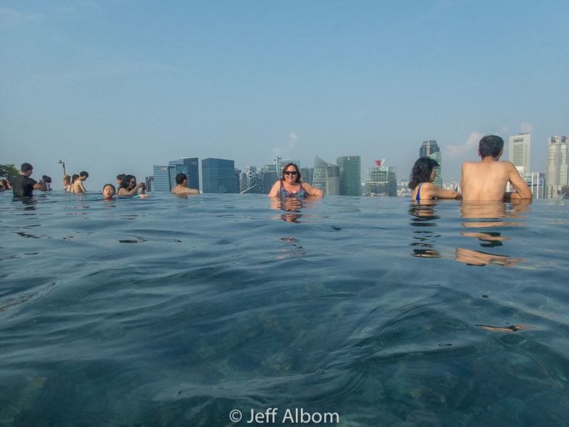 Marina Bay Sands Review: Is It Worth the High Price? 12 Morning is more crowded in the Marina Bay Sands Singapore infinity pool