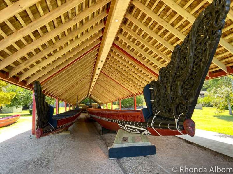 The ngatokimatawhaorua waka is one of two waka under canopy in Waitangi, Bay of Islands, New Zealand