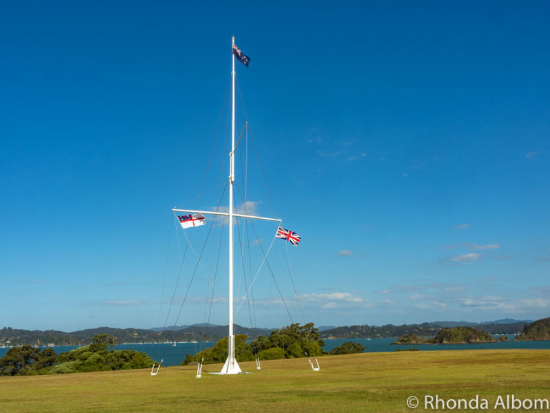 Flagstaff flying three flags at Waitangi New Zealand