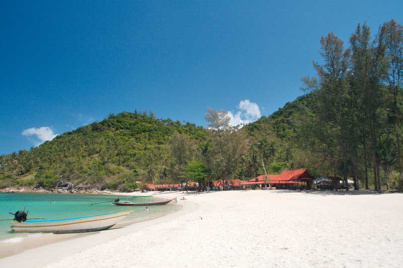 White sand and turquoise waters of Bottle Beach on Koh Phangan, one of the best beaches in Thailand